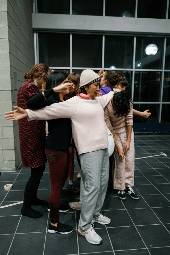 A picture containing person, floor, building, indoor

Description automatically generated